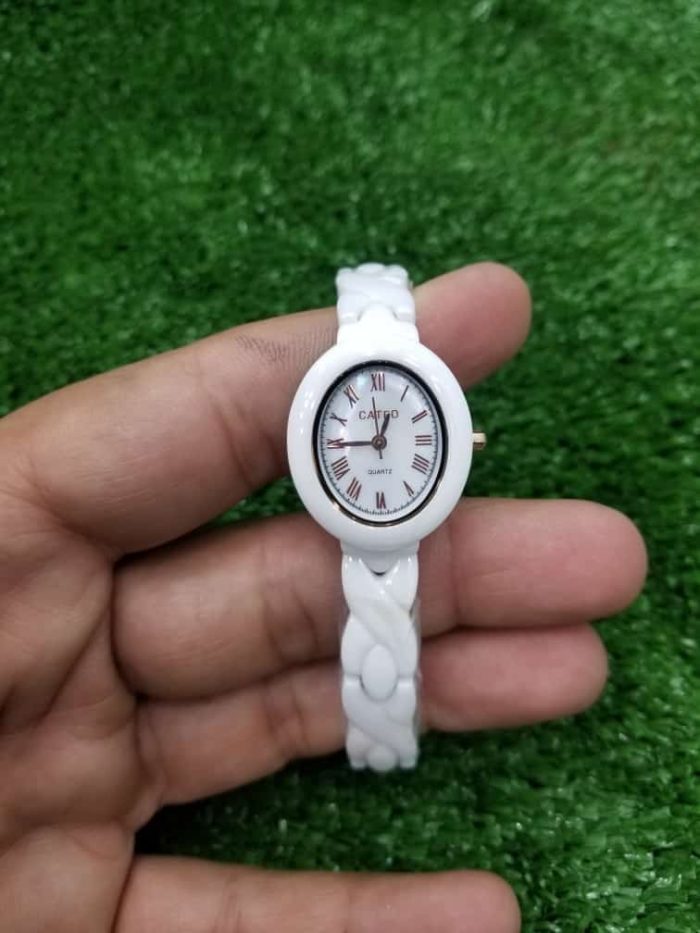 cateo white ceramic oval dial ladies watch in hand view